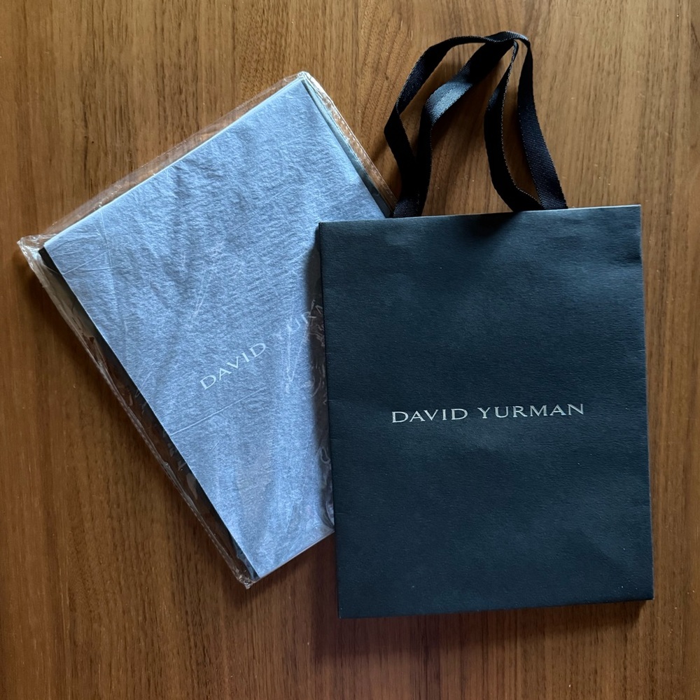 Original David Yurman Bag, Brand New 
8”x10” one piece, sealed in packaging.